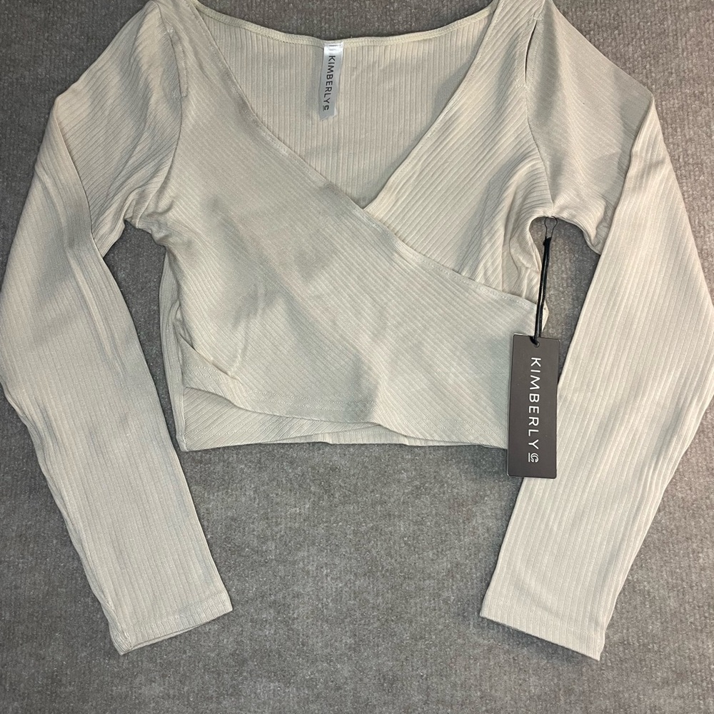 Kimberly C Women's Cream Wrap Top, small
